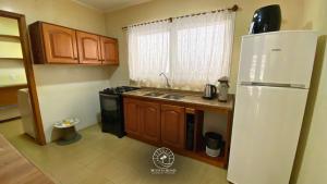 Nhà bếp/bếp nhỏ tại Apto de verão a 300mts do mar – Aceita pet