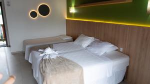 Voodi või voodid majutusasutuse Hotel Pé na Areia toas +191 fotot