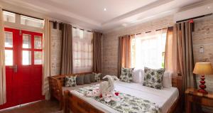 Ένα ή περισσότερα κρεβάτια σε δωμάτιο στο Ambiance Villa +33 φωτογραφίες