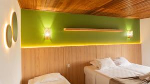 Voodi või voodid majutusasutuse Hotel Pé na Areia toas