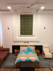 Ένα ή περισσότερα κρεβάτια σε δωμάτιο στο Villa Soleil, face à la mer