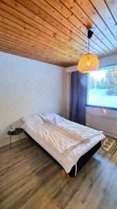 En eller flere senge i et værelse på Peaceful 3 bedroom rowhouse