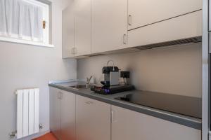 Kuchyň nebo kuchyňský kout v ubytování Appartamento Grigna2410 - Primaluna