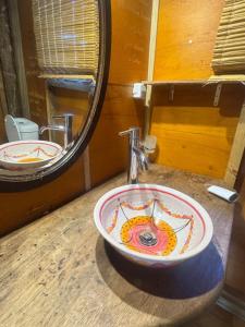 a sink in a bathroom with a mirror at Amanda Relax and nature beautiful beach in Playa Hermosa