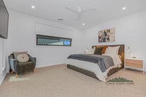 En eller flere senge i et værelse på 37 Sand Piper