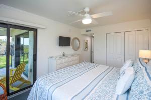 Ένα ή περισσότερα κρεβάτια σε δωμάτιο στο Direct beach access from your condo Sanibel Island 1A1 +27 φωτογραφίες