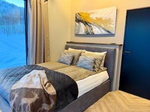 Ένα ή περισσότερα κρεβάτια σε δωμάτιο στο Aurora Suite