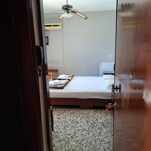 Ένα ή περισσότερα κρεβάτια σε δωμάτιο στο Oasis Room's