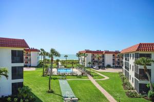 an aerial view of a resort yard with a swimming pool at 3rd Story Sanibel Condo With Coastline Views 3C3 in Sanibel