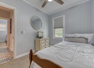 Ένα ή περισσότερα κρεβάτια σε δωμάτιο στο Beach Goers Paradise