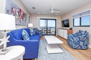 Μια τηλεόραση ή/και κέντρο ψυχαγωγίας στο 3rd Floor Beachfront Condo On Sanibel Island With Panoramic Views 5A3