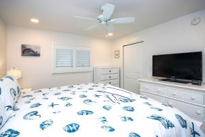 Ένα ή περισσότερα κρεβάτια σε δωμάτιο στο 1BR 3rd floor Sanibel condo with endless ocean views 5B3 +24 φωτογραφίες