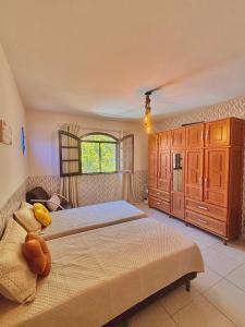 En eller flere senge i et værelse på Refúgio Amor de Mãe + 17 billeder