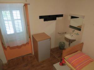 Koupelna v ubytování HI Hostel Veli Losinj + 37 fotografií