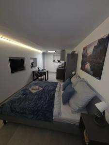 Ένα ή περισσότερα κρεβάτια σε δωμάτιο στο Fewo Hümo