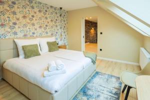 Ένα ή περισσότερα κρεβάτια σε δωμάτιο στο Apartament NaWidoki +17 φωτογραφίες