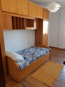 Ένα ή περισσότερα κρεβάτια σε δωμάτιο στο Torre Plaza 5