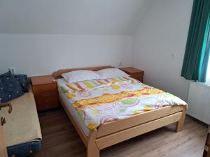 Postel nebo postele na pokoji v ubytování Gostišče Jelka + 11 fotografií