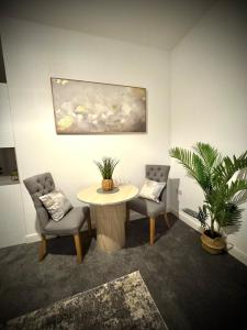 Et opholdsområde på Cozy Catherdral View