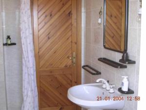 O baie la Appartamento in villa 5 posti letto +12 fotografii