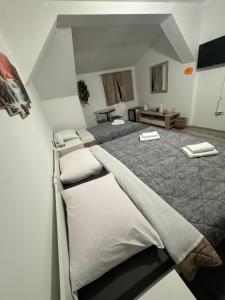 Ένα ή περισσότερα κρεβάτια σε δωμάτιο στο Guest House Neno