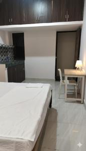 Postel nebo postele na pokoji v ubytování Sangam Villa