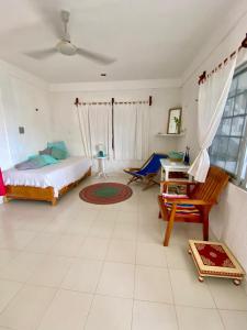 Giường trong phòng chung tại Barefoot bliss +3 ảnh