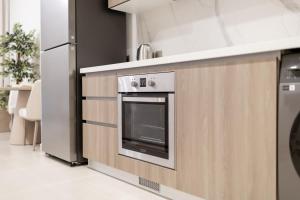 Η κουζίνα ή μικρή κουζίνα στο Yas Island Studio Walk to Formula One and Ferrari World +5 φωτογραφίες