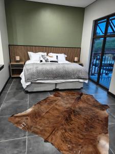 Кровать или кровати в номере Shalom Mountain & Fly-Fishing Lodge