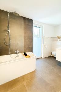 O baie la Ferienhaus Traumzeit