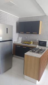 Køkken eller tekøkken på BRISAS DO FAROL casa 208