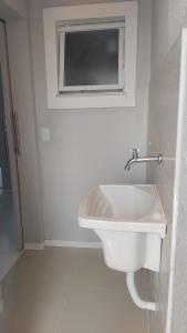 Et badeværelse på BRISAS DO FAROL casa 208