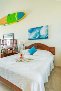 Ένα ή περισσότερα κρεβάτια σε δωμάτιο στο Agualina Kite Hotel