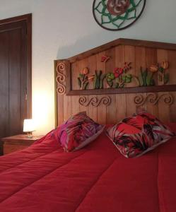 Ένα ή περισσότερα κρεβάτια σε δωμάτιο στο La Posada Encantada