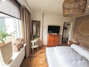 Ένα ή περισσότερα κρεβάτια σε δωμάτιο στο B&B Aan de Hoge Berg