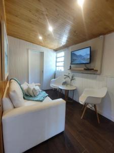 Et tv og/eller underholdning på Las Flores, casa del cerro