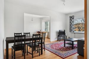 Et opholdsområde på Bright and spacious apartment