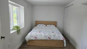 En eller flere senge i et værelse på Family Home