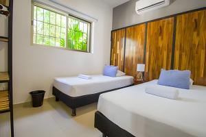 Postel nebo postele na pokoji v ubytování acogedora casa centrica