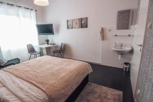 Ένα ή περισσότερα κρεβάτια σε δωμάτιο στο W28 Winterova +100 φωτογραφίες