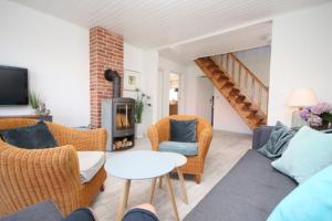 Posezení v ubytování Ferienhaus Düne