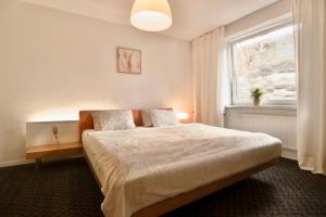 Ένα ή περισσότερα κρεβάτια σε δωμάτιο στο W28 Winterova