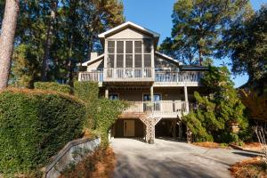 a large house with a wrap around porch at Soundside-Resort Amenities, Comm Pool-322, Out of Bounds in Corolla
