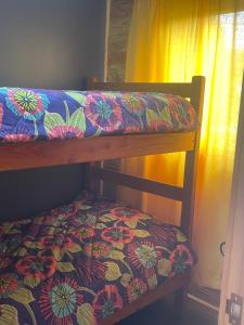 Ένα ή περισσότερα κρεβάτια σε δωμάτιο στο Cabaña centro