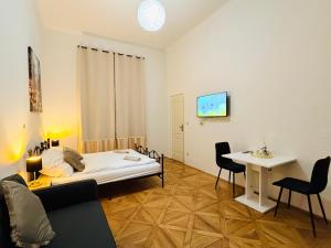 Ένα ή περισσότερα κρεβάτια σε δωμάτιο στο Zitna Downtown Residence