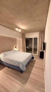 Ένα ή περισσότερα κρεβάτια σε δωμάτιο στο Almarena La Reserva UF 11 PB +22 φωτογραφίες