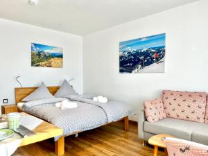 Ένα ή περισσότερα κρεβάτια σε δωμάτιο στο Montana Haus, Fewo A14, A17, B4 oder C8 +78 φωτογραφίες