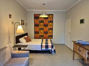 Postel nebo postele na pokoji v ubytování Chalé de Sampa