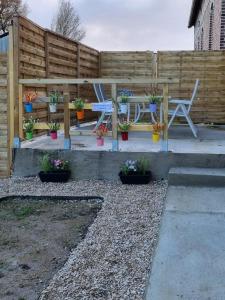 Zona de juegos infantil en Gîte L'Impériale d'Ham