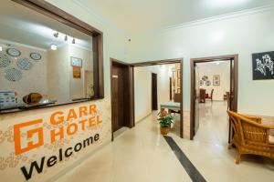 基加利Garr Hotel的大堂墙上挂着汽车酒店欢迎标语。 更多43张照片